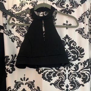 Black crop top with lace open back and black mini skirt set